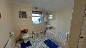 House | Bathroom | Combined shower/tub, deep soaking tub, free toiletries, hair dryer