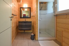 Shower, hair dryer, towels, toilet paper