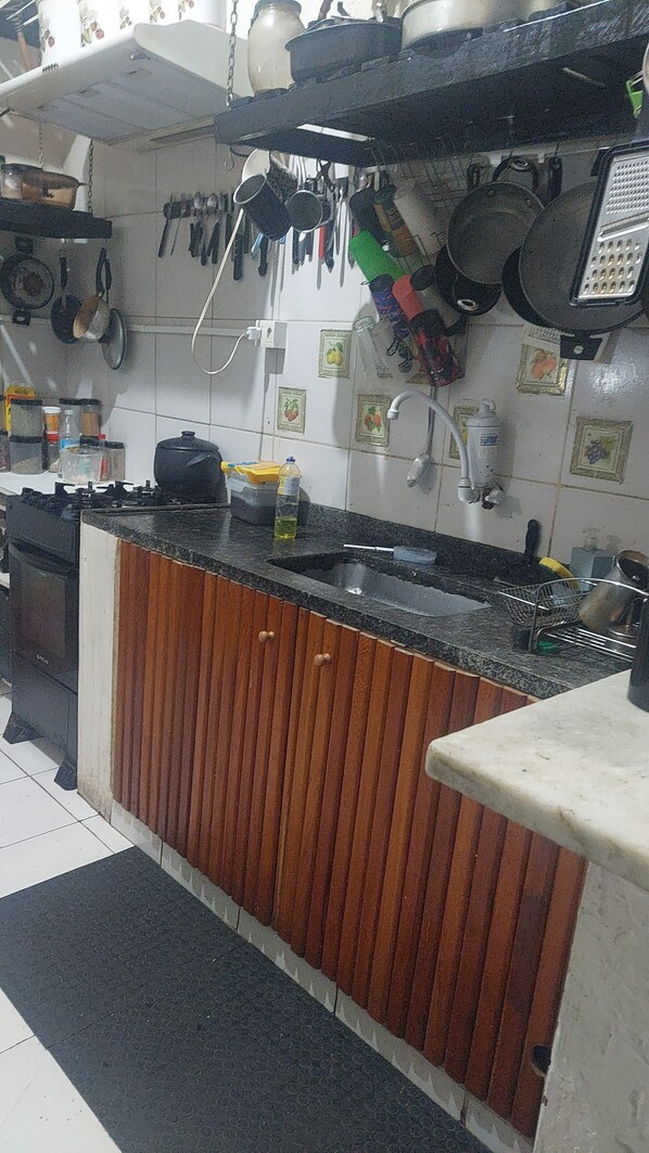 Fridge, microwave, stovetop, cookware/dishes/utensils