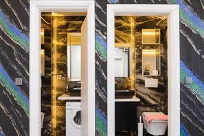 Douche, séchoir à cheveux, serviettes fournies