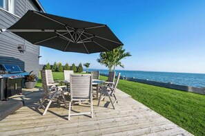 Outdoor dining - Black Swan Beachfront Home with Jacuzzi year round (Hampton Bays)