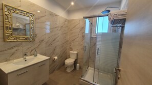 Shower, hair dryer, towels, soap