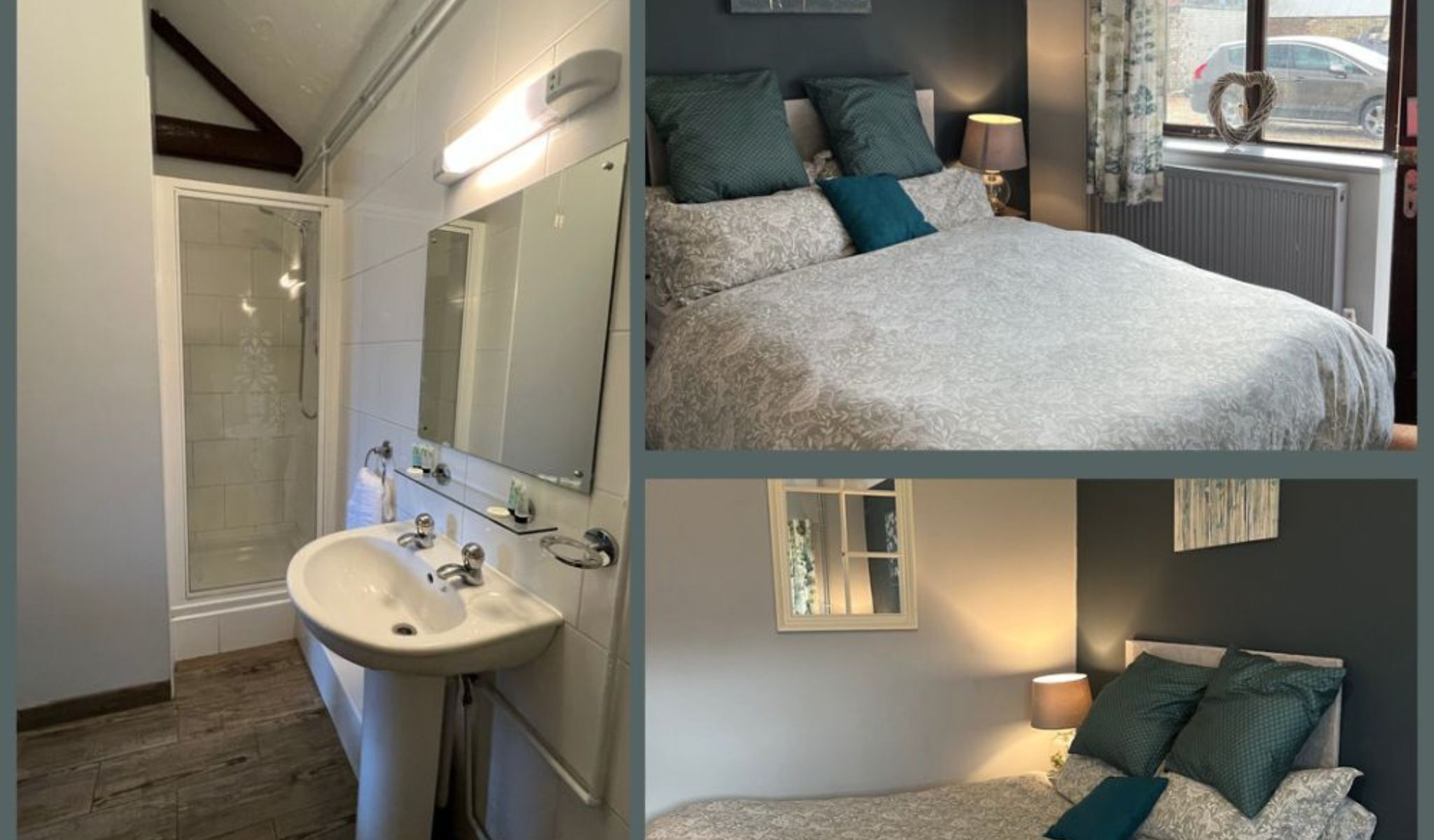 A bathroom with a glass shower enclosure, a sink, and a mirror. The bedroom features a bed with patterned bedding, a nightstand with a lamp, and a view of the street through a window.
