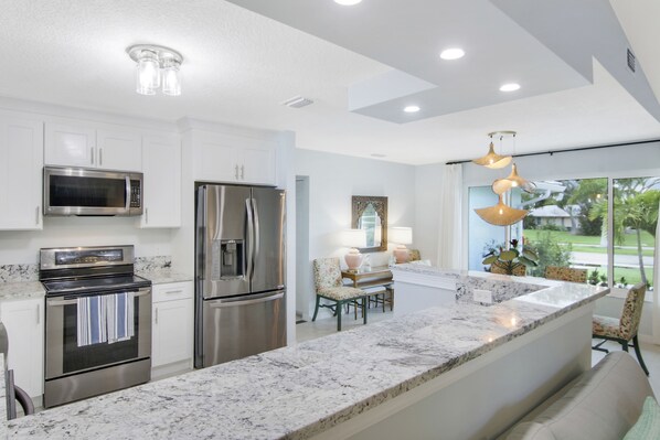 Private kitchen - Updated Stuart home in waterfront community with private backyard, pool & lanai (Stuart)