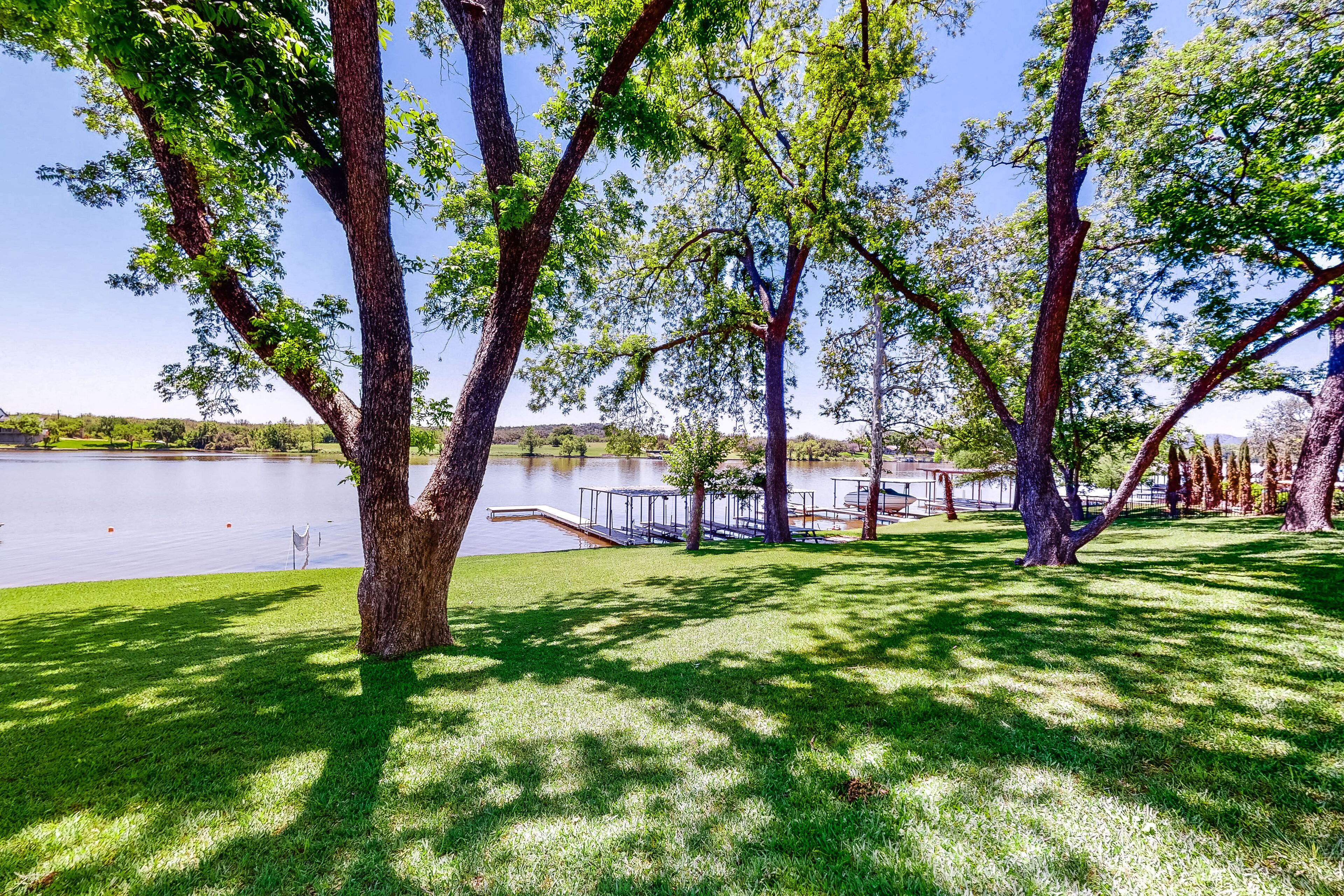 Lakefront home + casita with dock, kayaks, AC, & W/D - dog-friendly