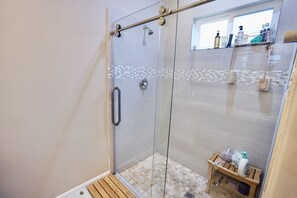 Shower, hair dryer, towels, soap