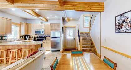 Inviting riverfront home with fireplace, mountain view & W/D - dog-friendly