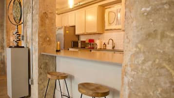 Classic Apartment | Private kitchen | Dining tables