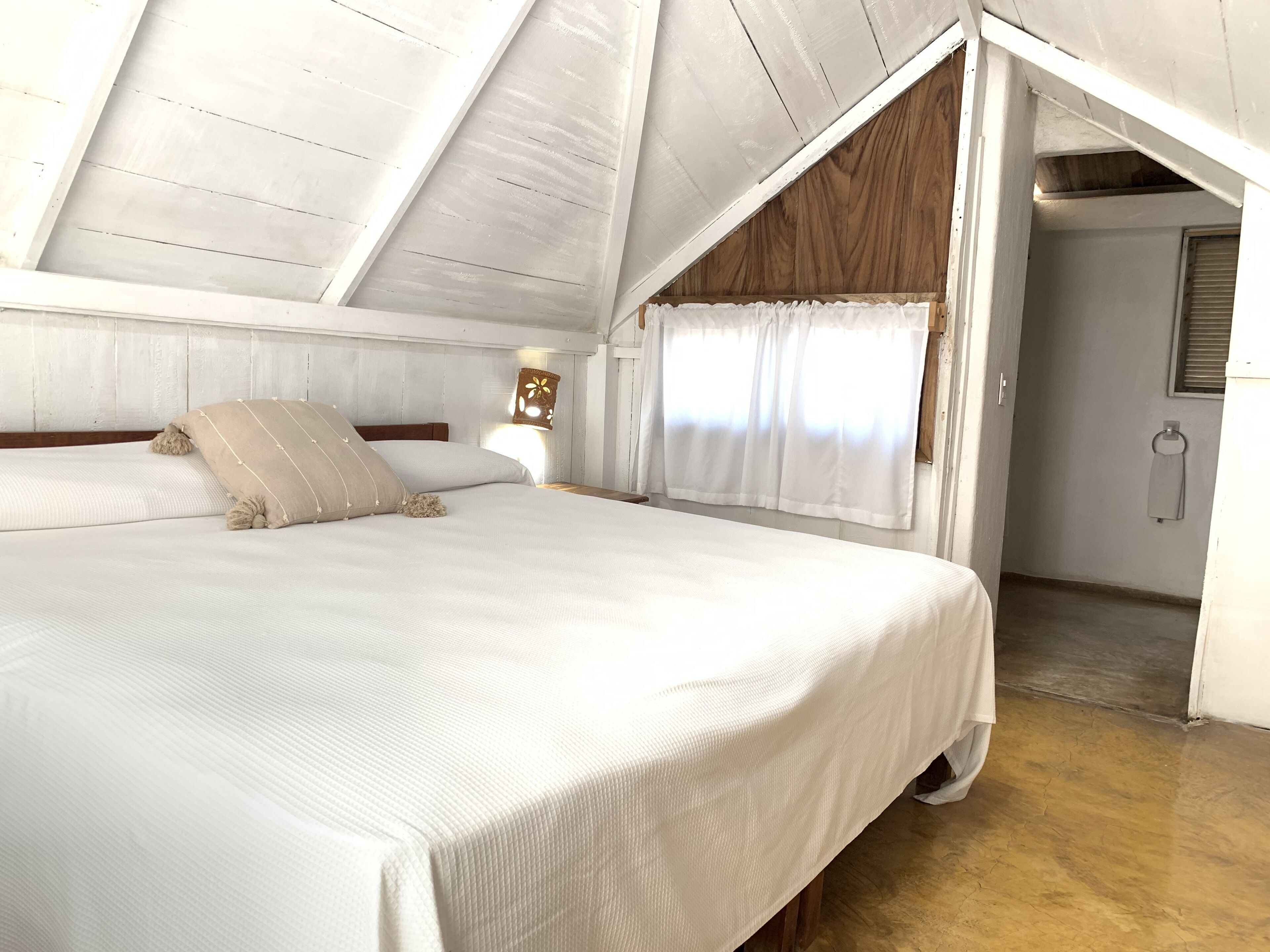 Premium bedding, down comforters, pillowtop beds, desk