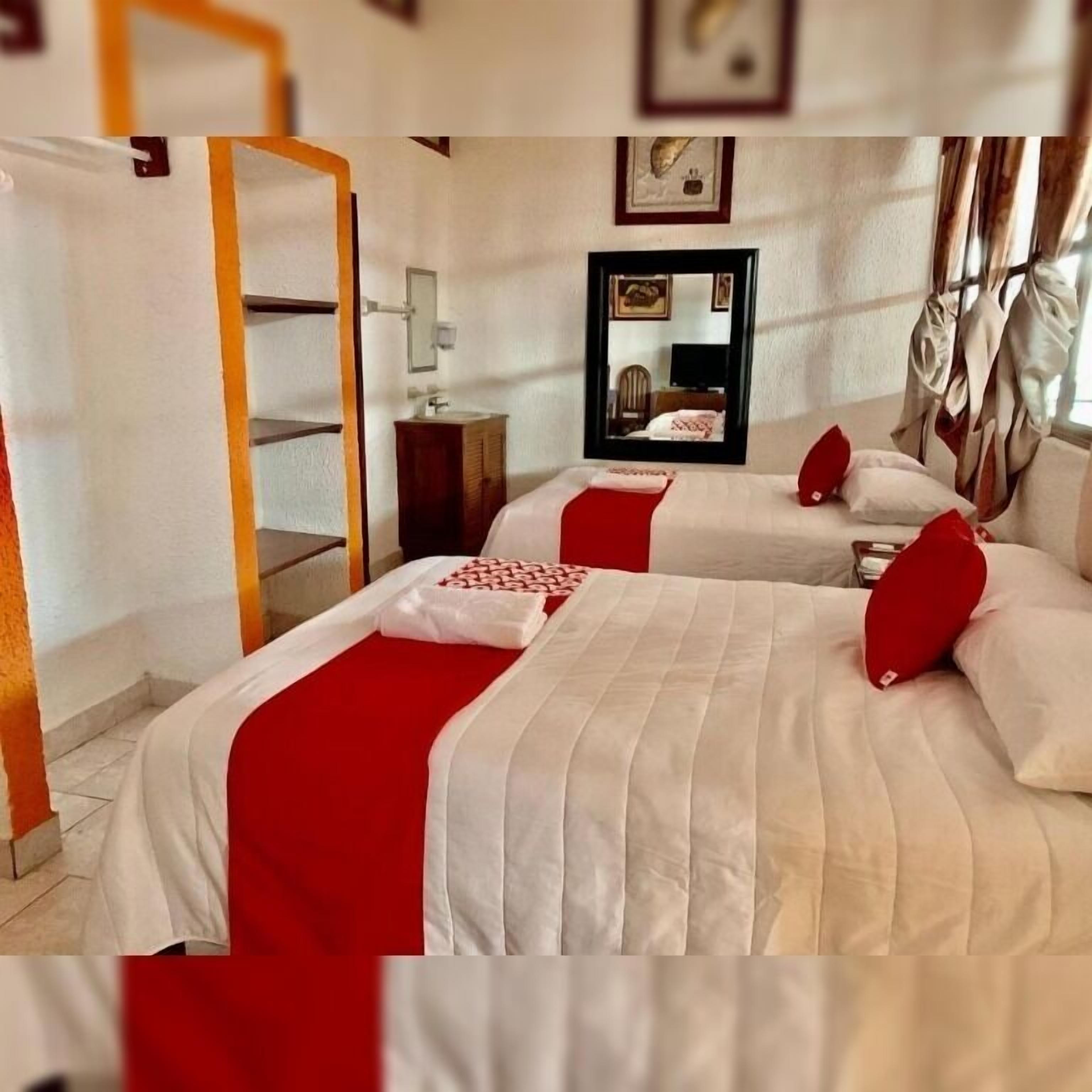 Habitación básica doble, 2 camas Queen size | Wifi gratis y ropa de cama 