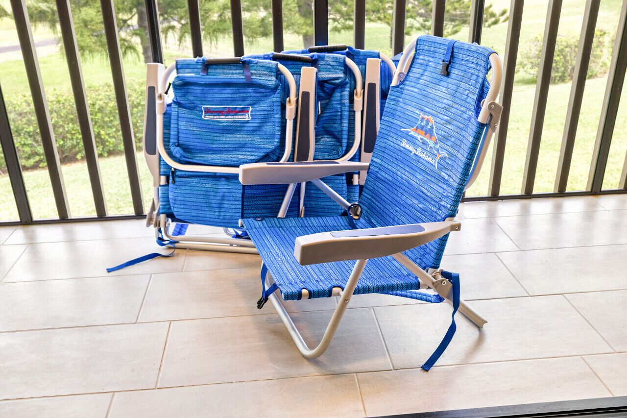 Beach chairs waiting on the lanai for a laid-back day by the water.
