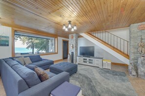 TV, fireplace, books