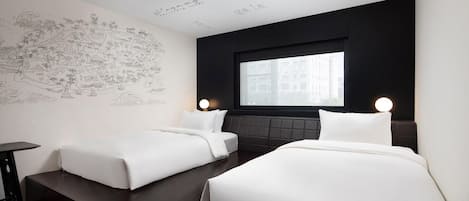 A hotel room with two beds, a dark headboard, a large window, and a wall with a map.