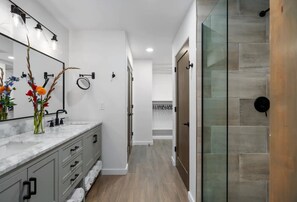 Shower, eco-friendly toiletries, hair dryer, towels