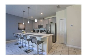 Fridge, microwave, oven, stovetop - Resort style, pool home within minutes to Disney (Kissimmee)