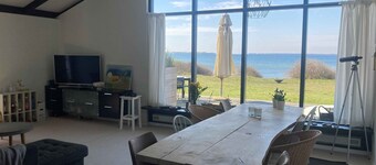 Cozy holiday home on a large beach plot