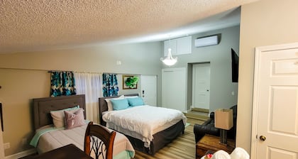 Renovated Suite with 1 queen bed and a Twin. Kitchen & bath for your privacy.