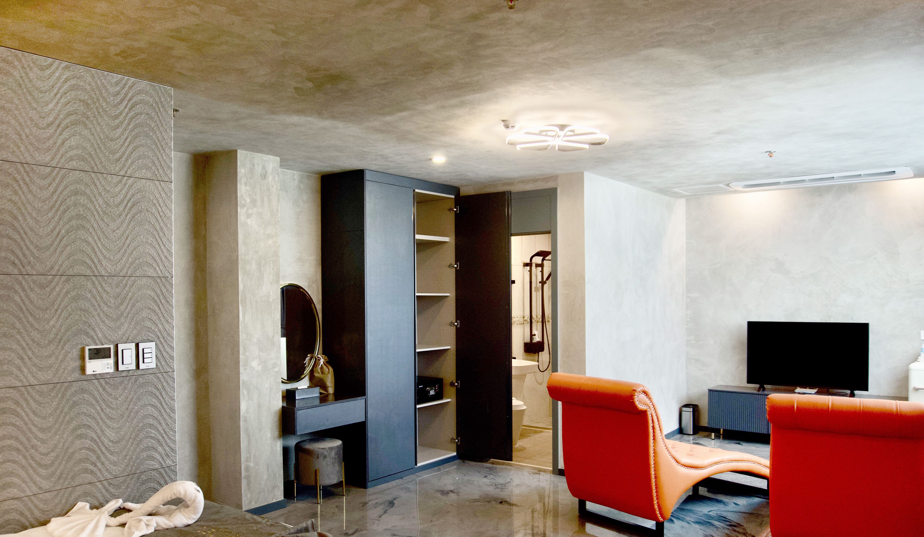 superior double or twin room | living area | 50-inch smart tv with cable channels, tv, netflix