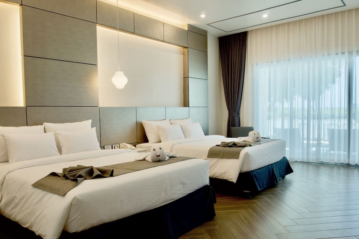 deluxe double room | 1 bedroom, minibar, in-room safe, individually decorated