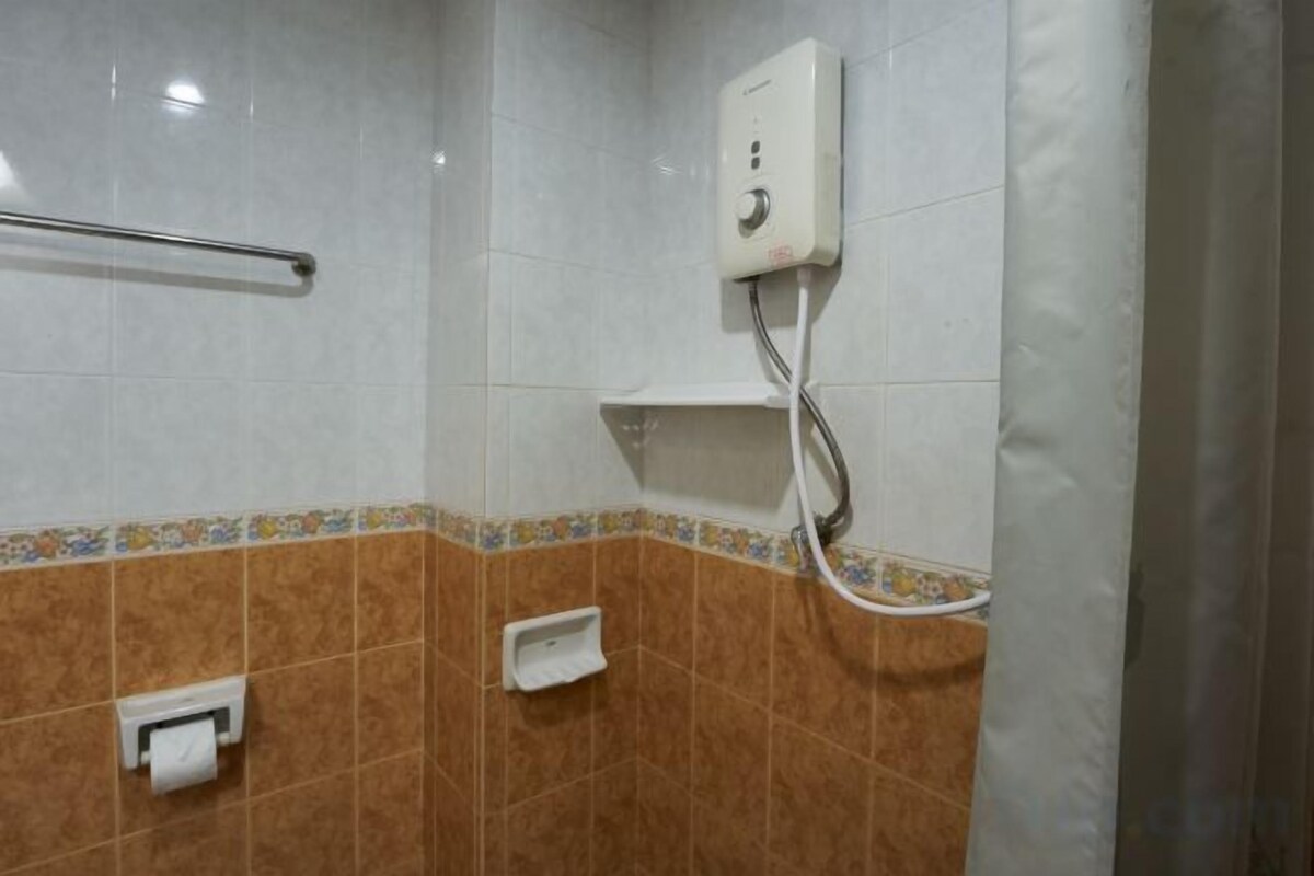 Bathroom | Shower, free toiletries, hair dryer, slippers