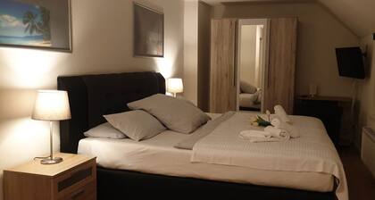 Apartment with Garden and City View