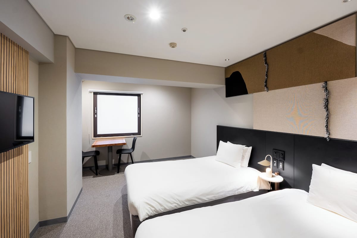 Chambre Deluxe avec lits jumeaux | Wi-Fi gratuit, draps fournis