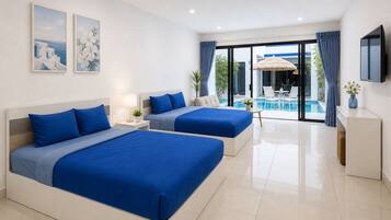 A hotel room with two beds, a TV, a pool area with a table and chairs, and a view of the outdoors.