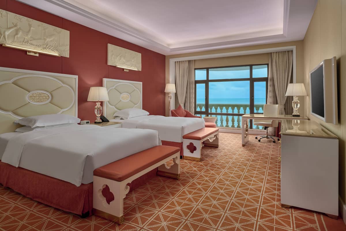 Chambre Deluxe avec lits jumeaux, vue mer | Literie de qualité supérieure, surmatelas