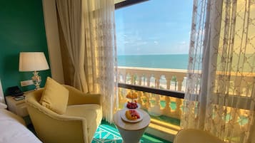 Habitación individual Deluxe, vista al mar | Ropa de cama de alta calidad, camas con pillow-top y minibar