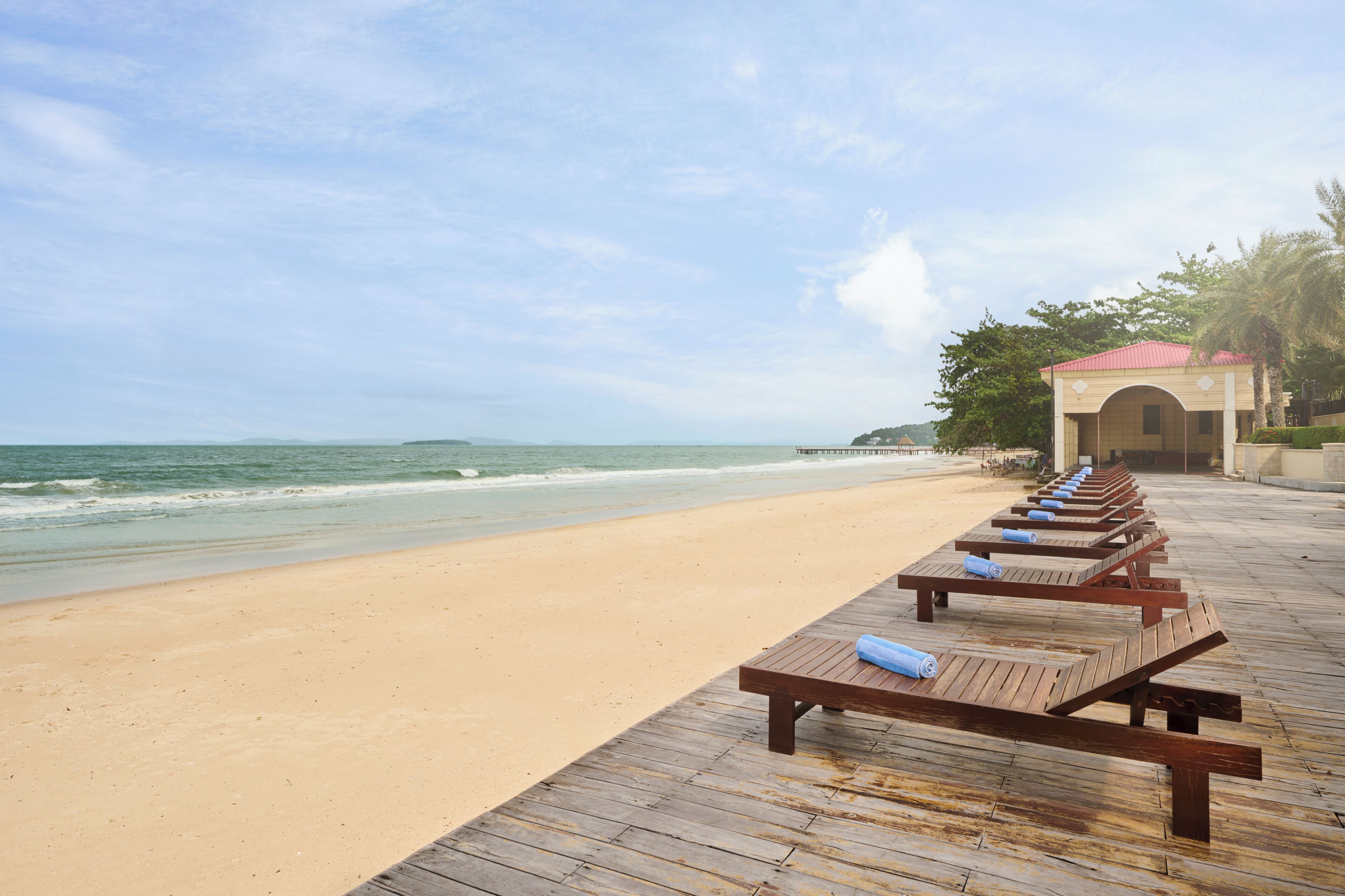 On the beach, sun loungers, beach umbrellas, beach towels