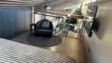 1 bedroom, desk, iron/ironing board, travel crib