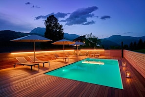 Seasonal outdoor pool, a heated pool