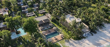 Outdoor pool, pool umbrellas, sun loungers