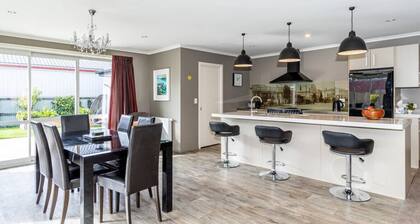 Right in town, pet and family friendly. Walk everywhere, garage plus extras