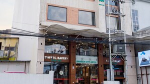 A multi-story building with a sign reading "SANGAM CITY HOTEL" and a "Sweets, Bakery" shop at the ground level. - Sangam City Hotel (Kathmandu)