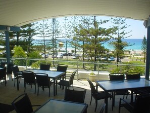 Relax and dine al fresco in this tranquil outdoor seating area with breathtaking views of the surrounding landscape.