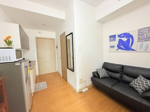 TV - Charming apartment with AC in vibrant Taguig (Taguig)