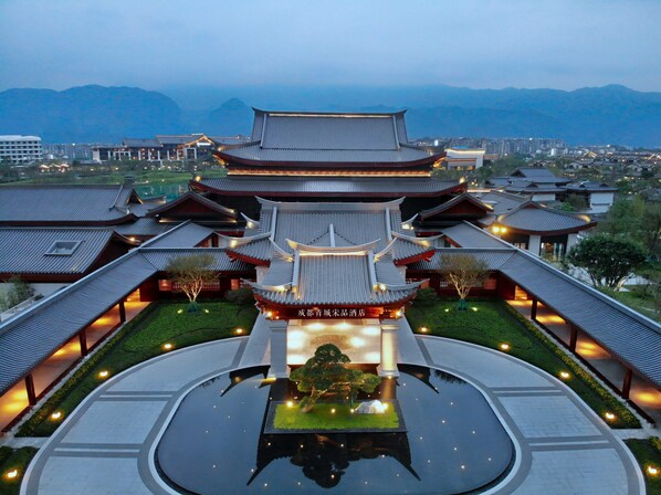 A traditional Chinese-style building with multiple levels and a central courtyard. - Song Hotel Chengdu Qingcheng  (Chengdu)