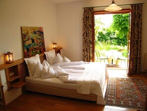 Comfort Double Room, Patio, Garden Area | Living area | 25-inch LED TV with satellite channels, TV - Das Römerstein - die pure WohlFühlOase (Jennersdorf)