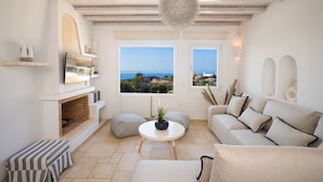 Paradisia Sunset Villa with Swimming Pool | 거실 공간 | 평면 TV