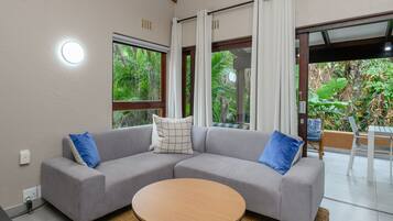 Classic Villa | Living area | Flat-screen TV, ping pong