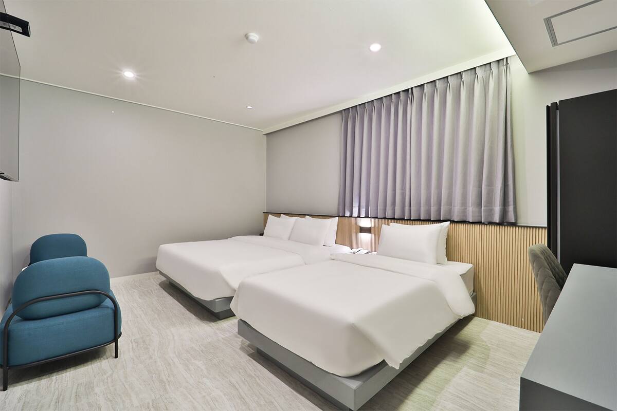 Habitación Premium con 2 camas individuales | Wifi gratis y ropa de cama