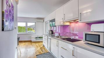 Family Apartment, 1 Bedroom, Mountainside (Wellness Suite Viola) | Private kitchenette | Fridge, microwave, oven, stovetop