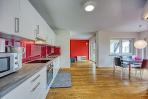 Family Apartment, 2 Bedrooms, Mountainside (Wellness Suite Orchid) | Private kitchen | Fridge, microwave, oven, stovetop