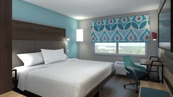 A hotel room with a bed, a desk, a chair, a TV, and a window with a view.