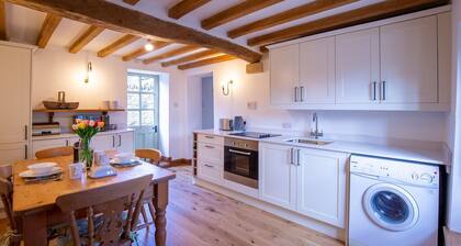 Hope Cottage, Naunton - pet friendly with a wood burner and garden