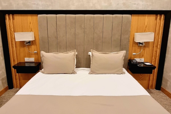 Free minibar, in-room safe, desk, laptop workspace