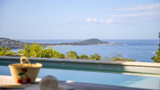 A poolside view overlooking a coastal landscape with a distant island and clear skies. - VILLA CAMELIA- 5 bedrooms, sea view, swimming pool (ALBITRECCIA)
