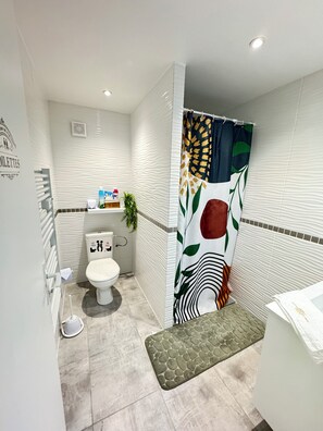 Hair dryer, soap, shampoo, toilet paper