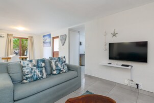 Classic Villa | Living area | Flat-screen TV, table tennis